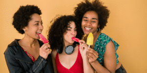 Three women eating ice cream